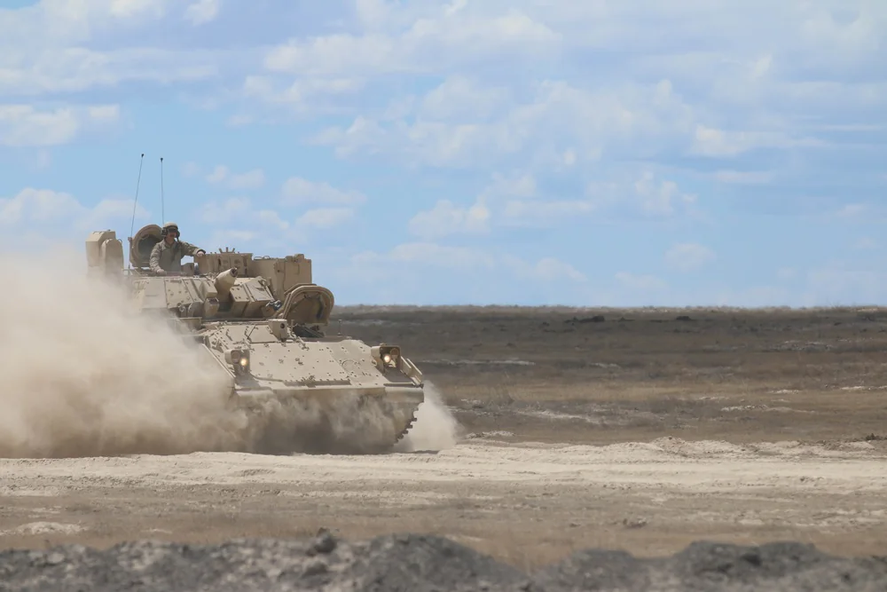 Bradley tracked armoured vehicle during a field exercise.