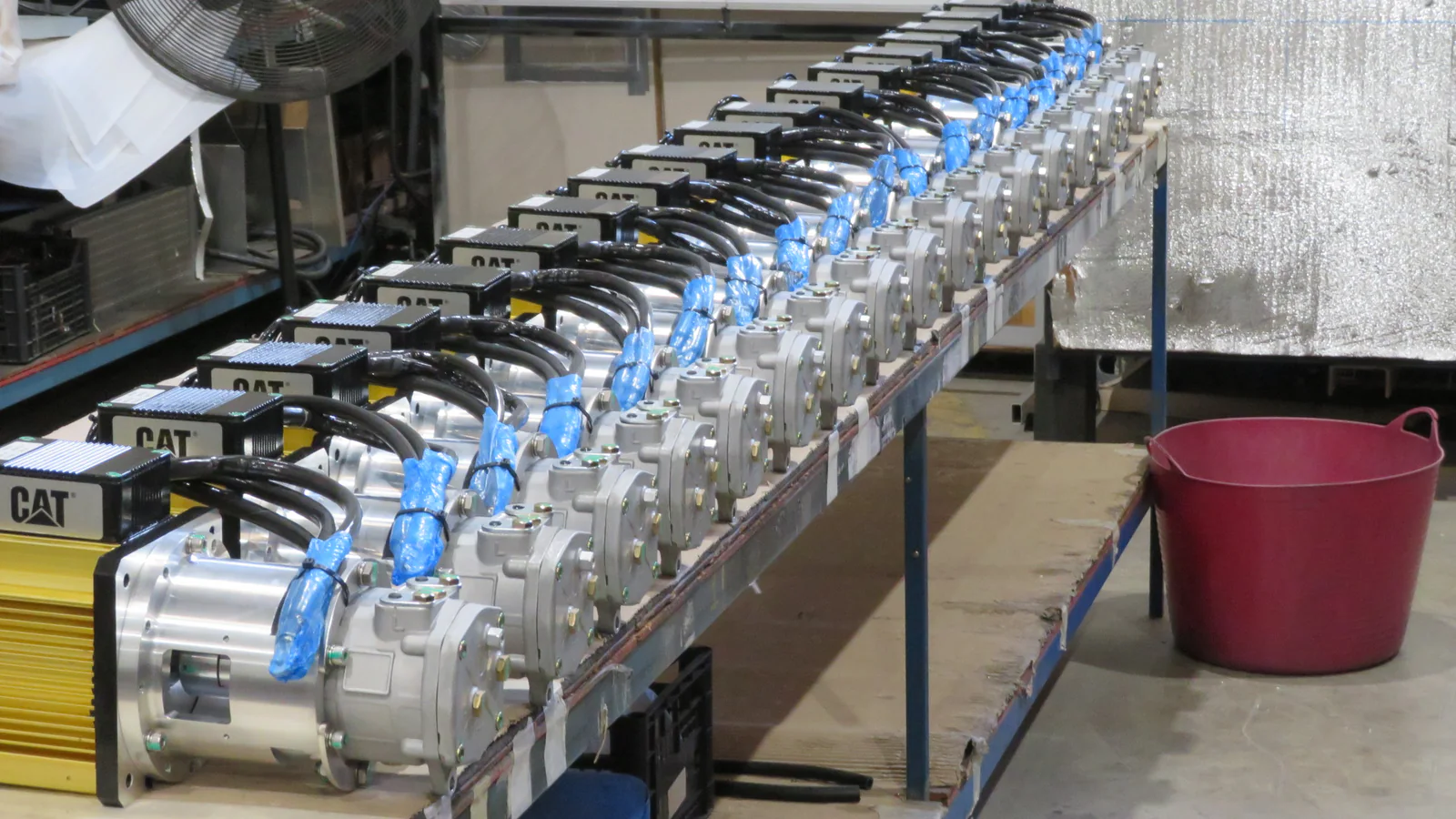 Compressor assemblies on a manufacturer production bench.