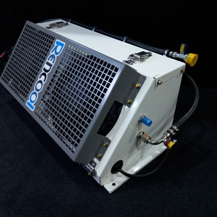 Rencool cooling module with condenser fan, protective grille and refrigerant connections.