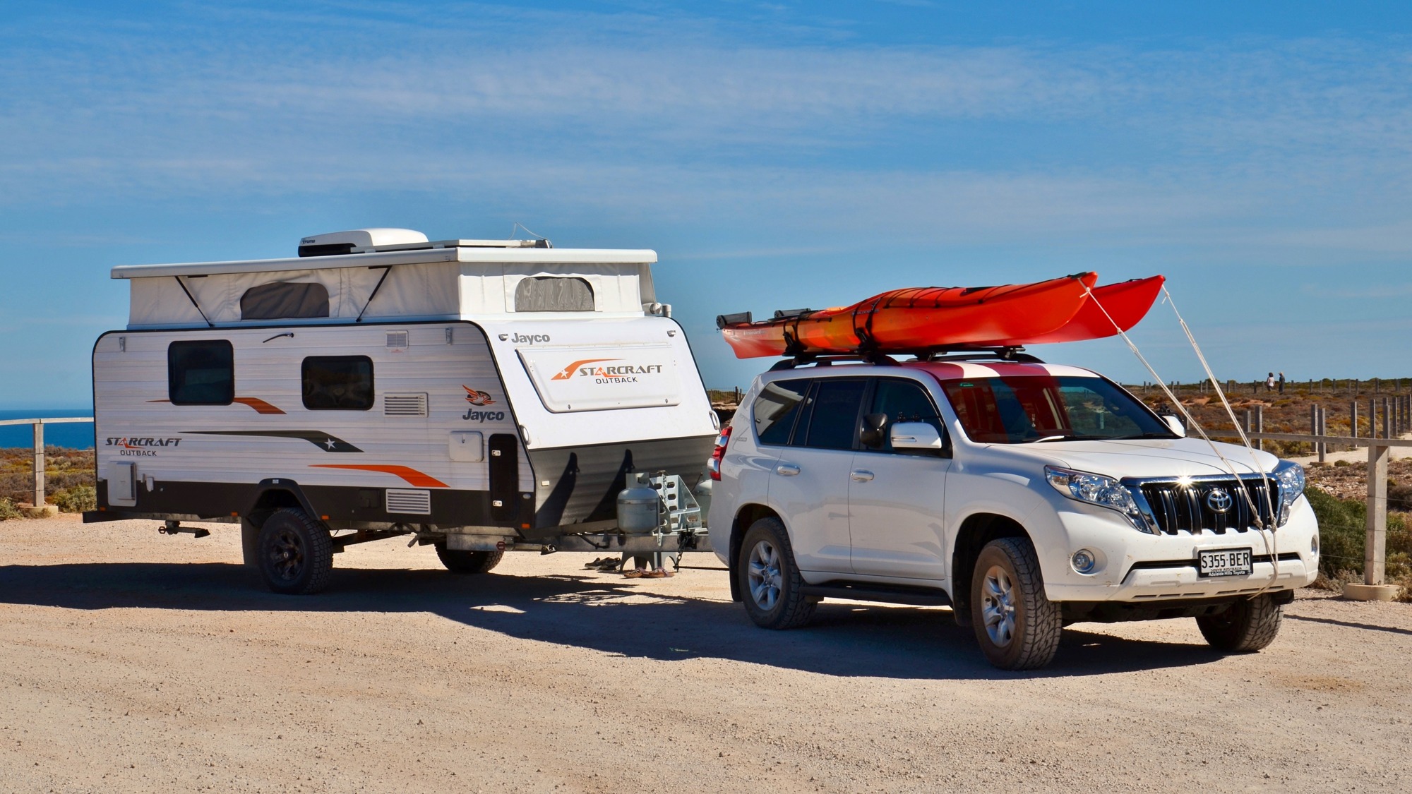 Toyota Land Cruiser Prado towing a Jayco Starcraft caravan at Bunda Cliffs, Australia.